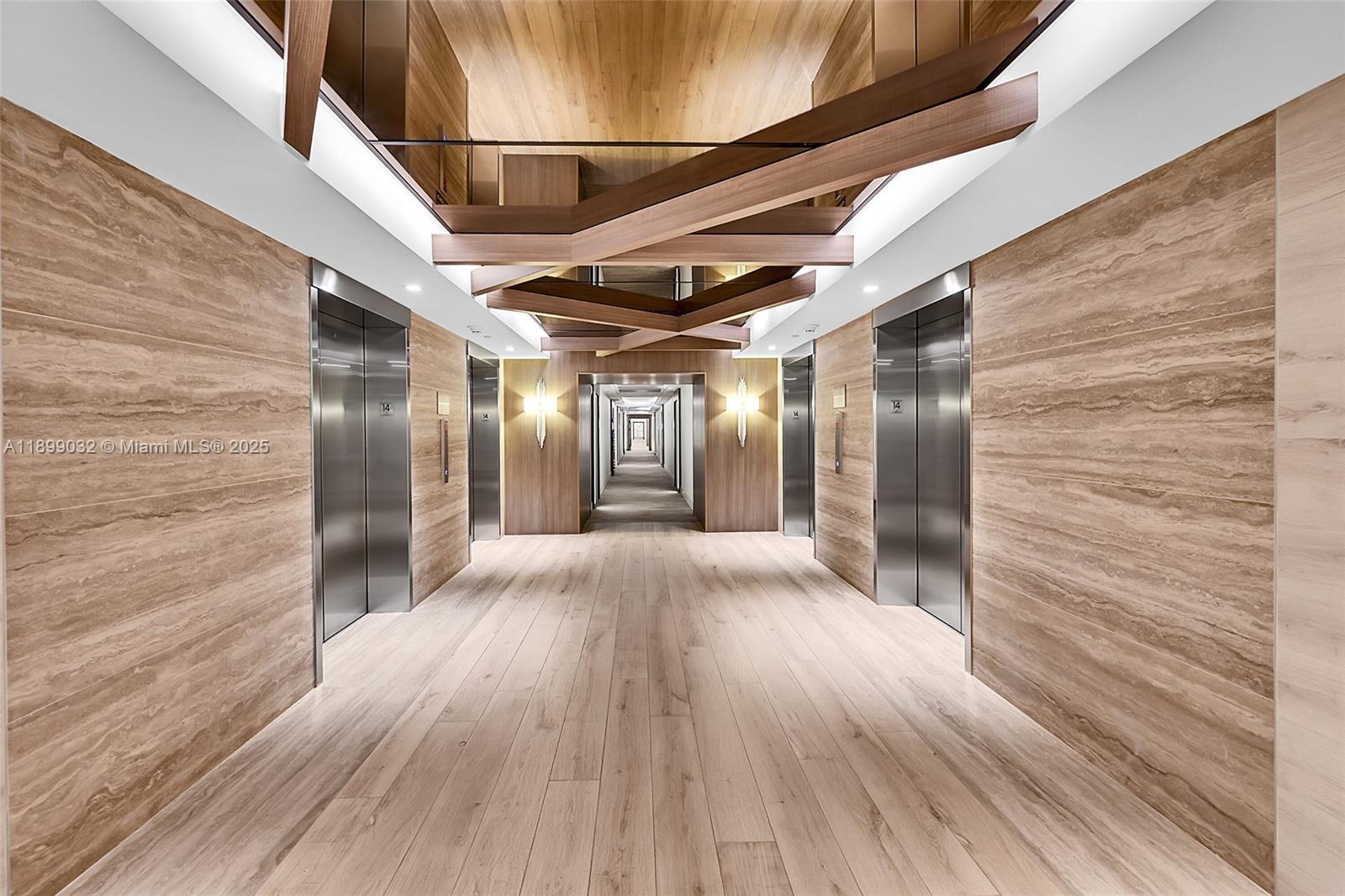 2301 Collins Avenue, Unit 736 Miami Beach, FL 33139 - Photo 14 of 15 a view of hallway with wooden floor