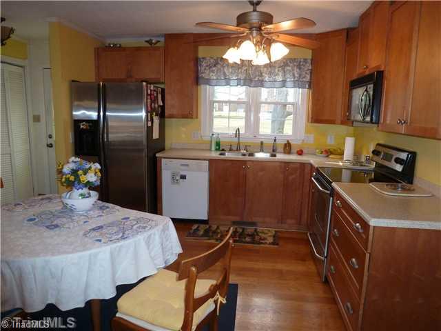 3215 Rolling Road High Point, NC 27265 - Photo 2 of 16 Kitchen. Updated Kitchen with new hardwood floors solid surface countertop and appliances
