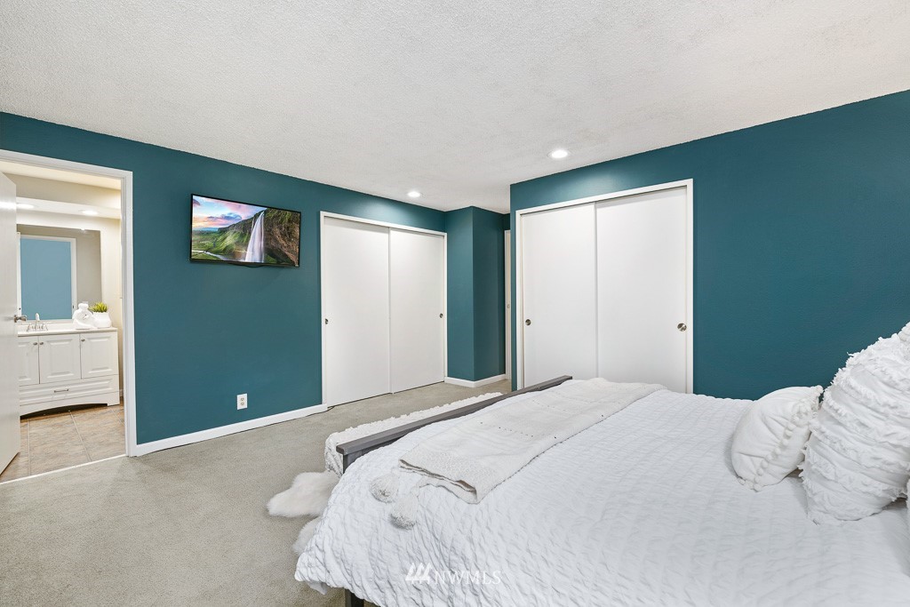 21913 8th Place West Bothell, WA 98021 - Photo 14 of 33 a bedroom with a bed and a window