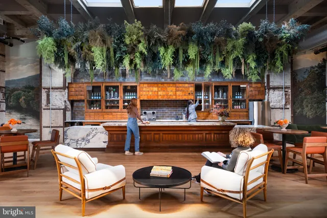 a outdoor living space with patio furniture and a potted plant