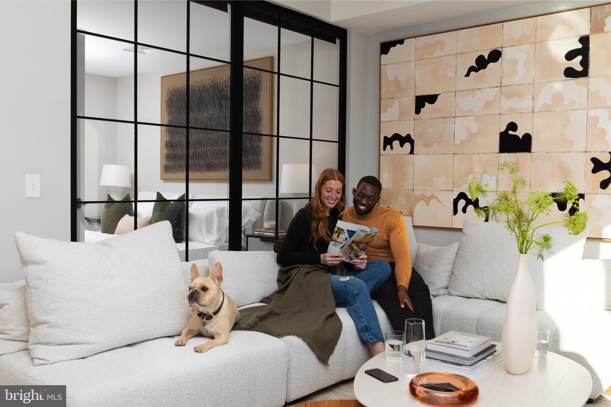 1325 North Beach Street, Unit 725 Philadelphia, PA 19125 - Photo 3 of 19 a living room with furniture and a window