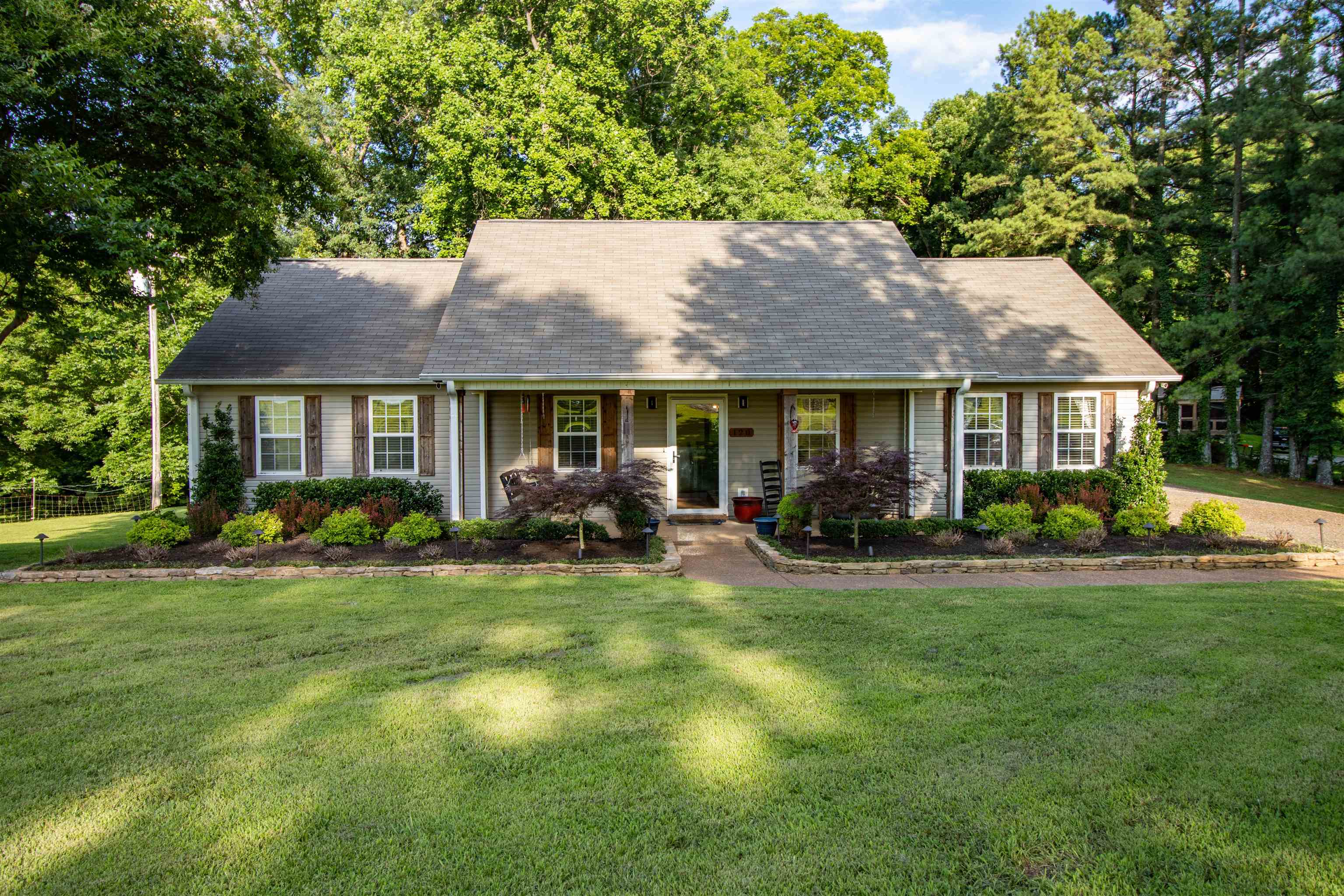 120 Craig Road Ripley, TN 38063 - Photo 1 of 38 Ranch-style residence featuring a prominent covered front porch with four columns