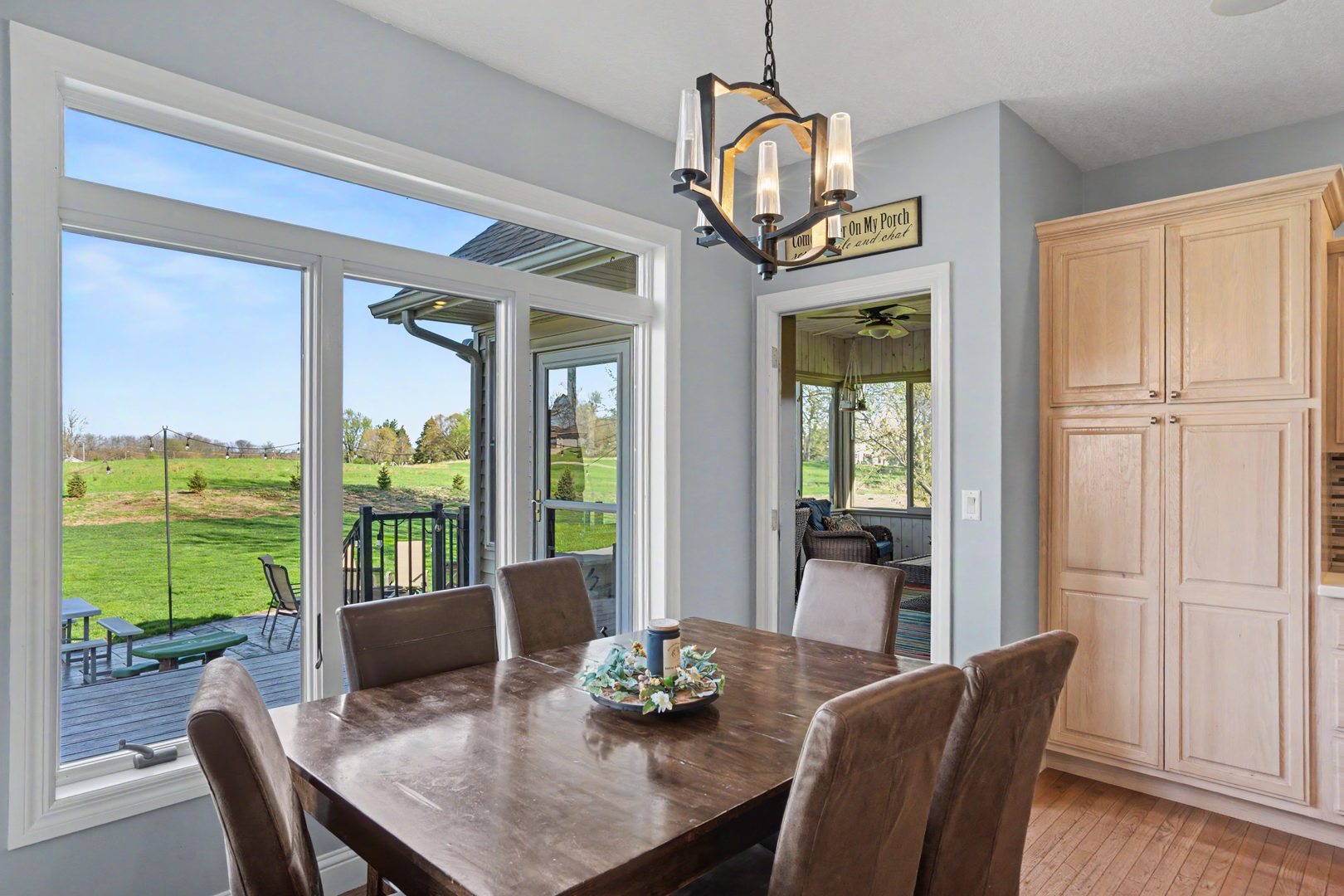 918 Melody Hills Fulton, IL 61252 - Photo 15 of 43 a view of a dining room with furniture window and outside view