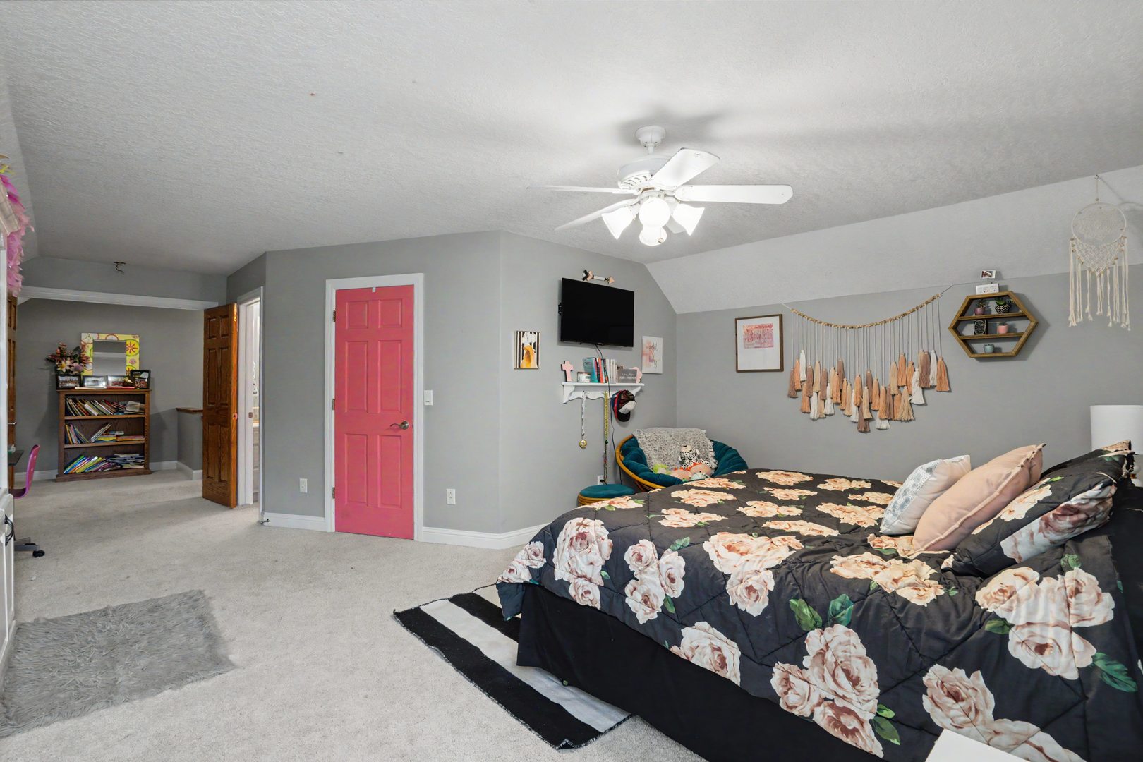 918 Melody Hills Fulton, IL 61252 - Photo 19 of 43 a bedroom with a bed and a chandelier