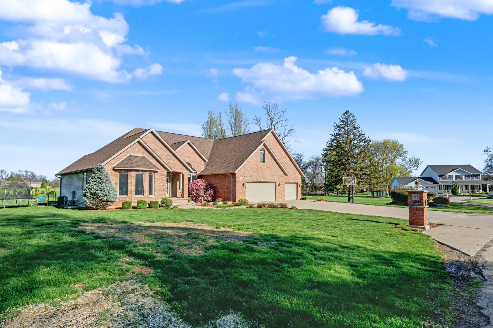 918 Melody Hills Fulton, IL 61252 - Photo 2 of 43 a front view of a house with a yard