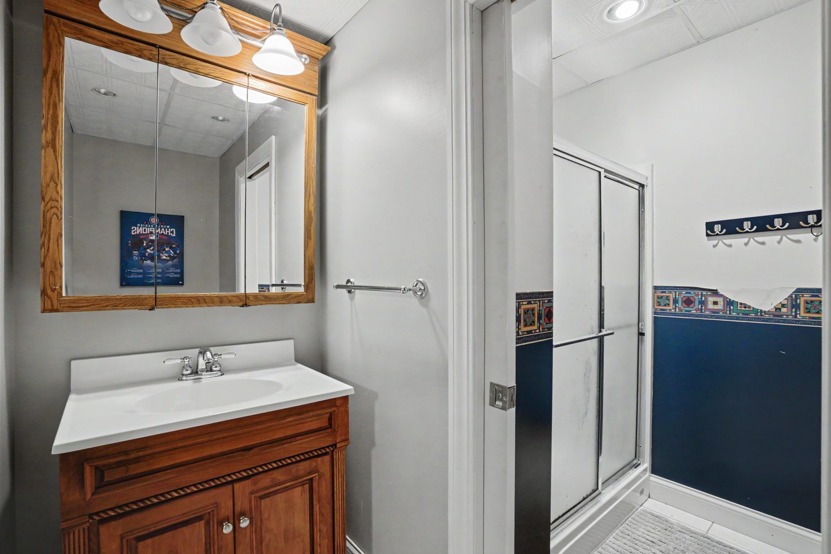 918 Melody Hills Fulton, IL 61252 - Photo 29 of 43 a bathroom with a sink vanity granite and a mirror