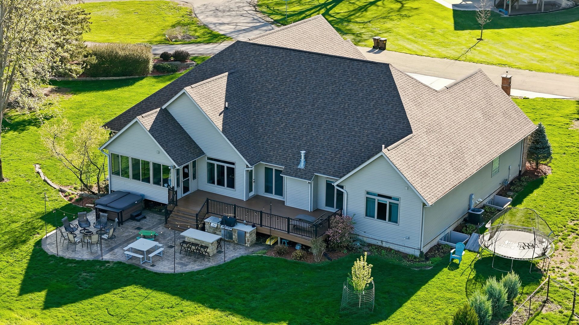 918 Melody Hills Fulton, IL 61252 - Photo 37 of 43 a aerial view of a house with swimming pool garden and patio