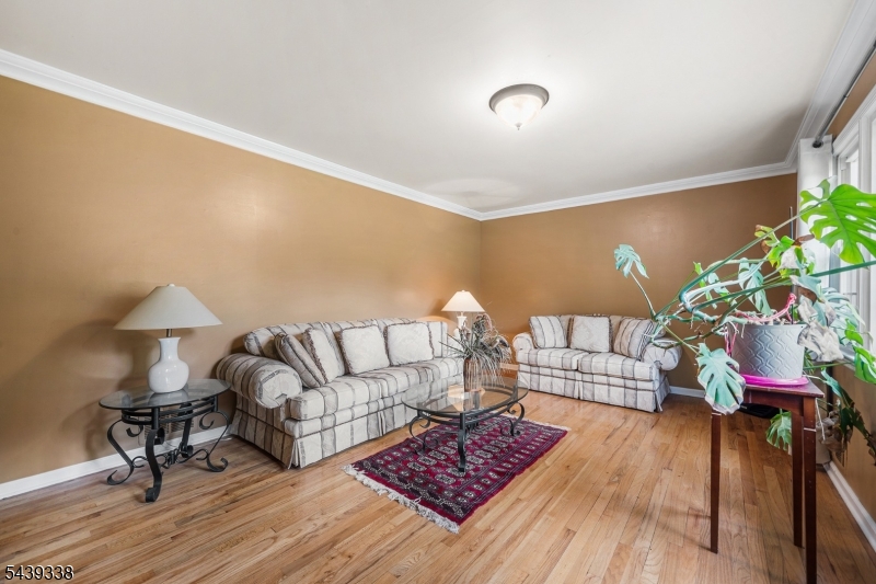 1 Oak Grove Road Flemington, NJ 08822 - Photo 5 of 29 a living room with furniture and a lamp