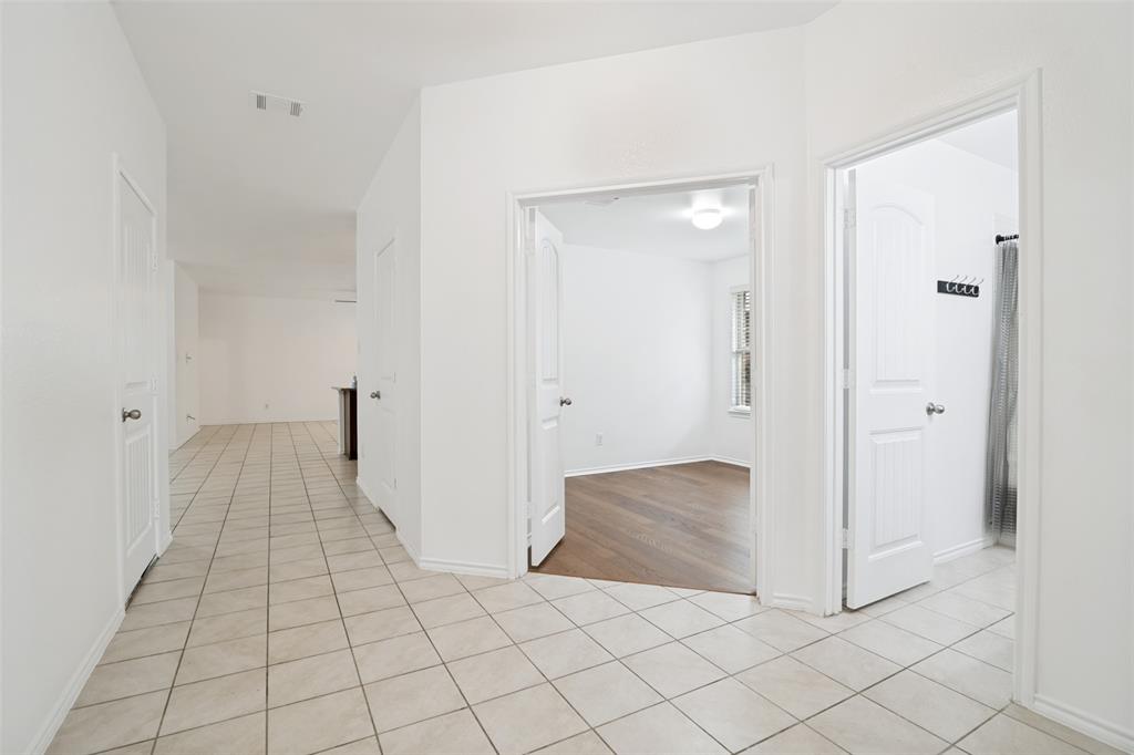 3415 Emerson Road Forney, TX 75126 - Photo 4 of 26 a view of a hallway