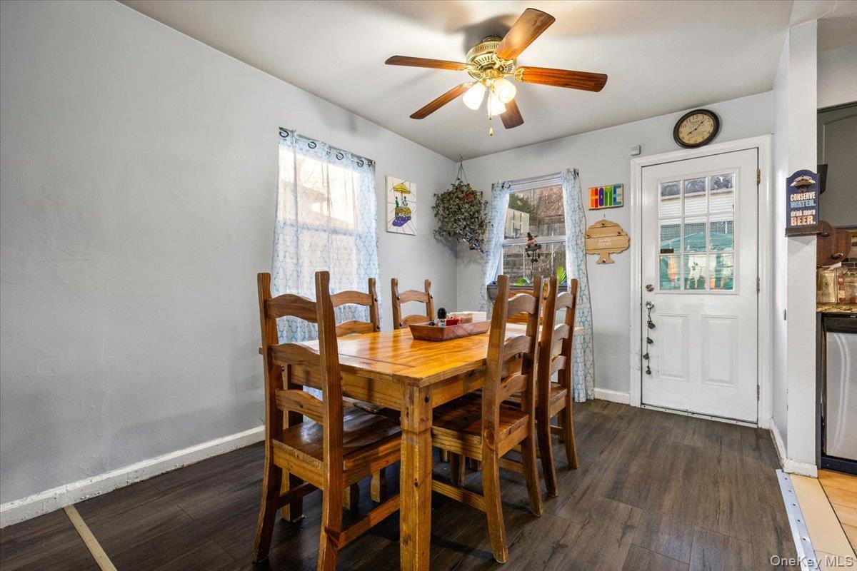 2761 Hering Avenue Bronx, NY 10469 - Photo 9 of 29 Dining space featuring dark wood-type flooring and ceiling fan