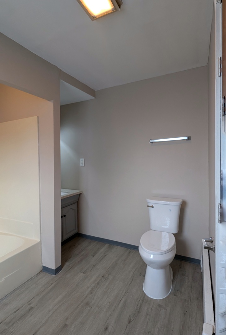 1405 Connor Avenue Lockport, IL 60441 - Photo 2 of 9 a bathroom with a toilet and a