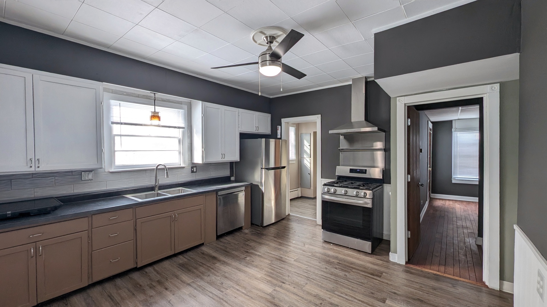 1405 Connor Avenue Lockport, IL 60441 - Photo 3 of 9 a kitchen with stainless steel appliances granite countertop a refrigerator a sink dishwasher a stove with wooden cabinets and floor