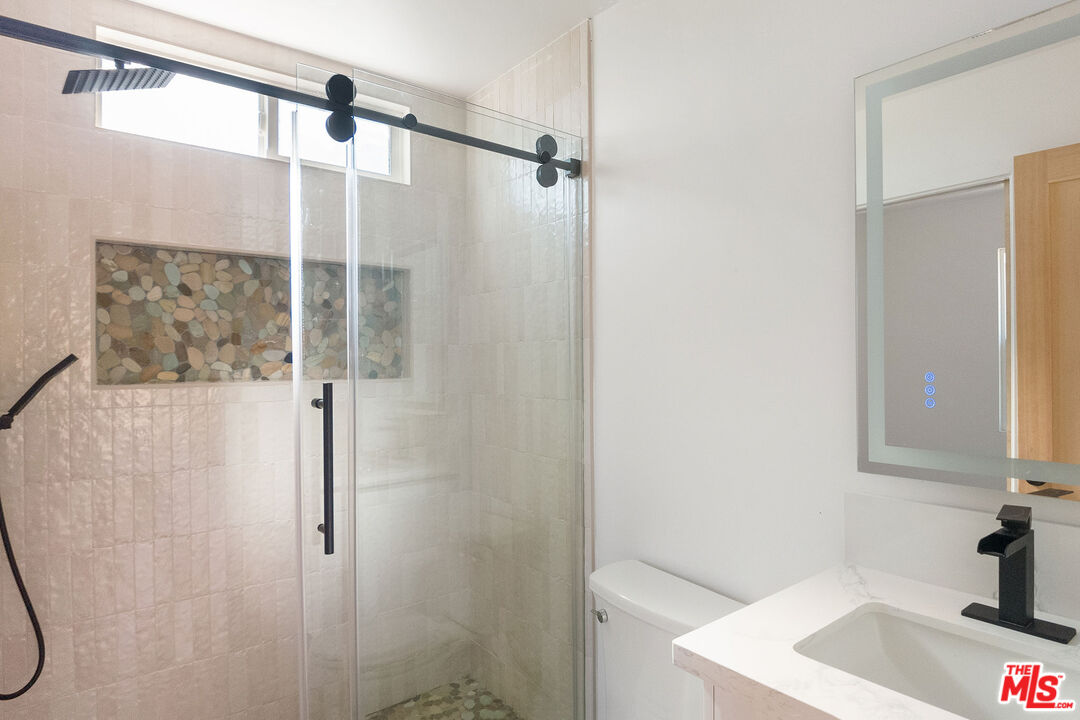 1795 Morada Place Altadena, CA 91001 - Photo 22 of 41 a bathroom with a sink and a shower