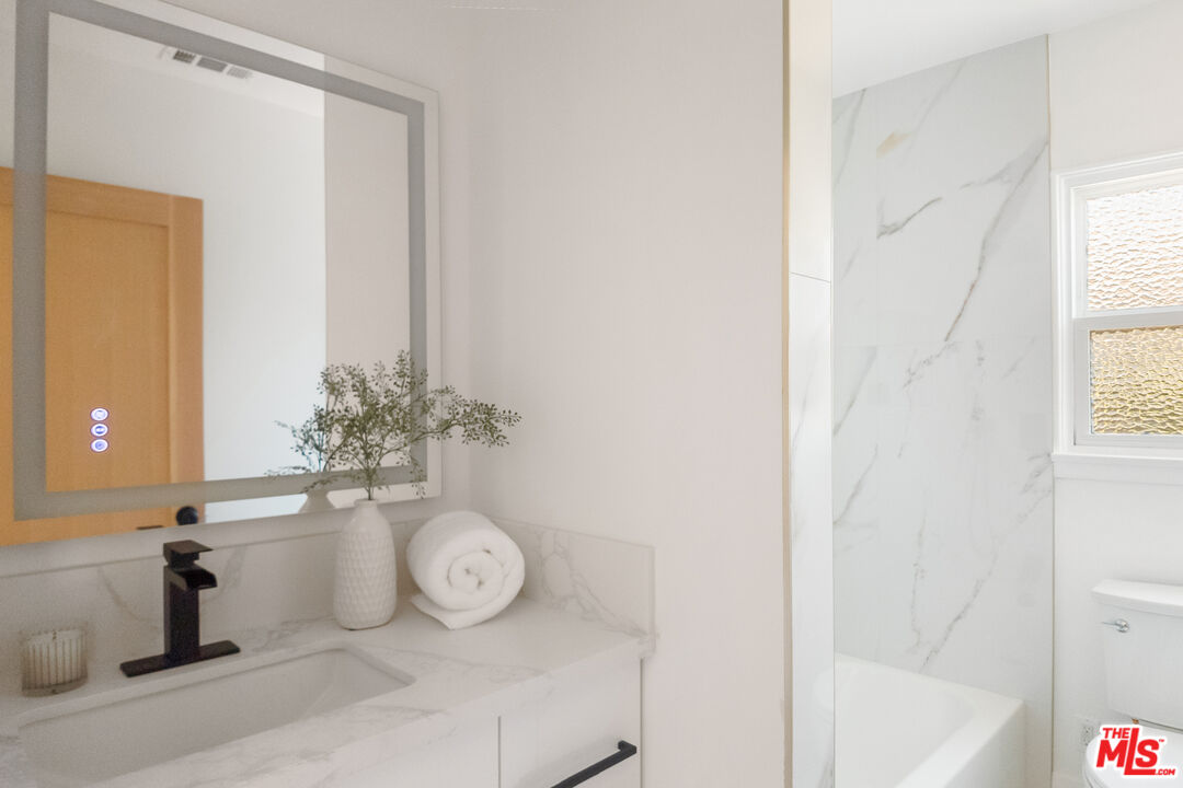 1795 Morada Place Altadena, CA 91001 - Photo 29 of 41 a bathroom with a sink and a mirror