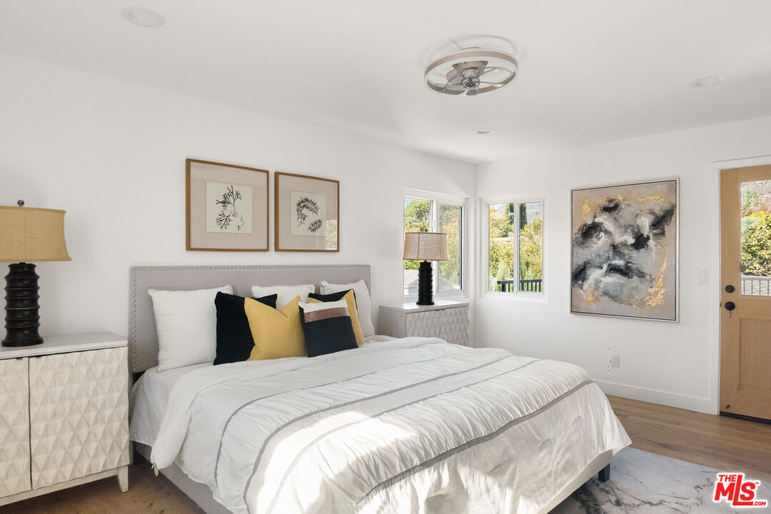 1795 Morada Place Altadena, CA 91001 - Photo 30 of 41 a bedroom with a large bed and a window