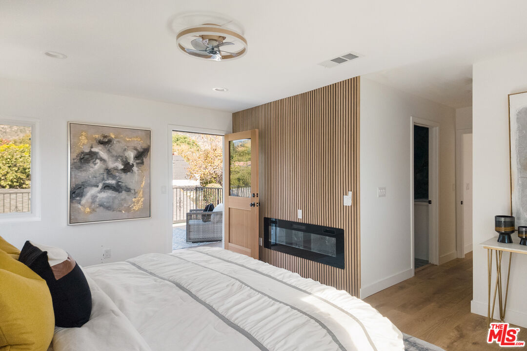 1795 Morada Place Altadena, CA 91001 - Photo 31 of 41 a bedroom with a bed and a window