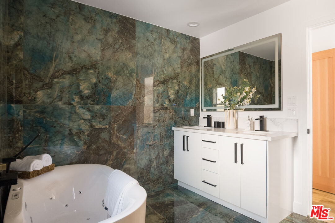 1795 Morada Place Altadena, CA 91001 - Photo 33 of 41 a bathroom with a sink a mirror and a shower