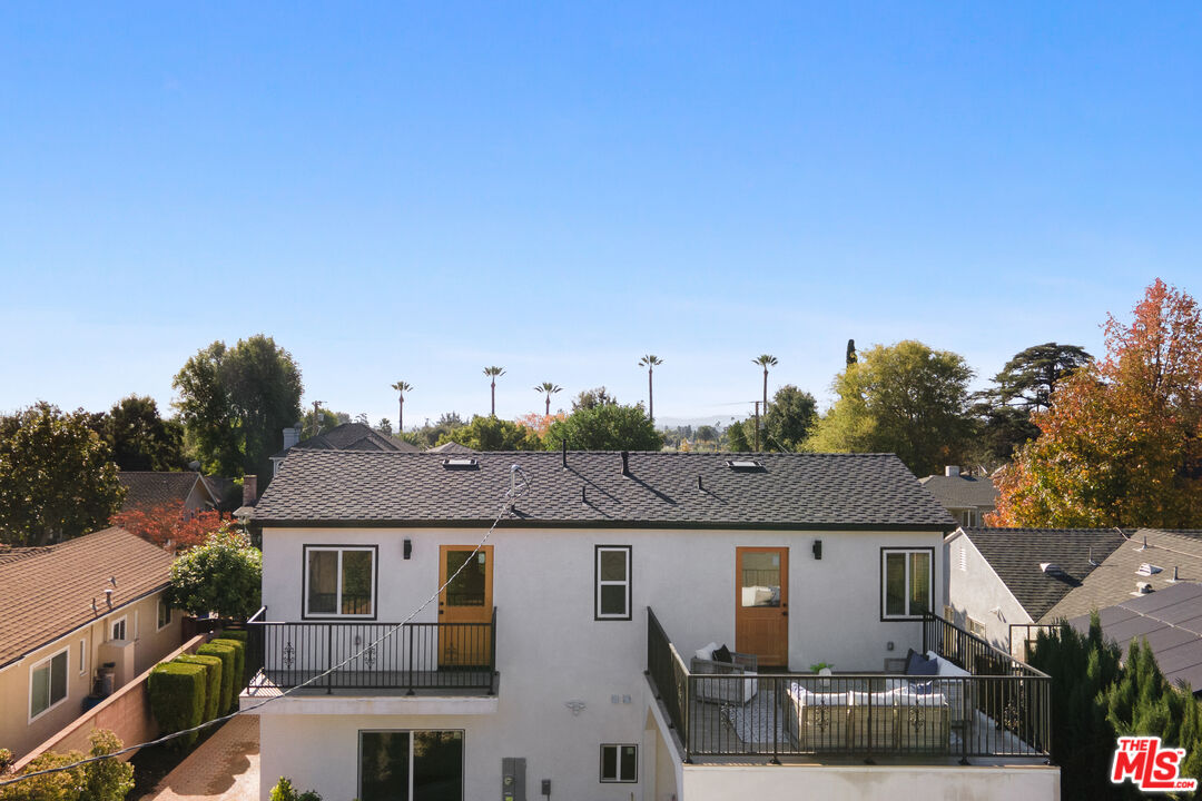 1795 Morada Place Altadena, CA 91001 - Photo 36 of 41 a view of a white house next to a yard