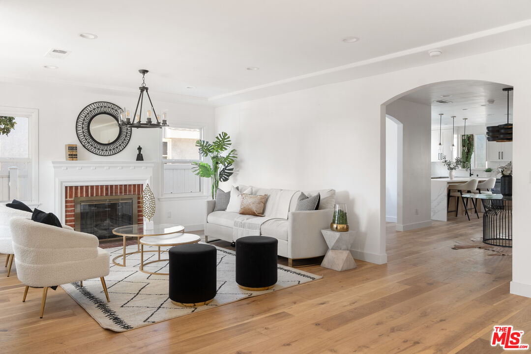1795 Morada Place Altadena, CA 91001 - Photo 4 of 41 a living room with furniture and a fireplace