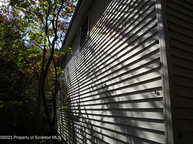 a view of a building from a backyard