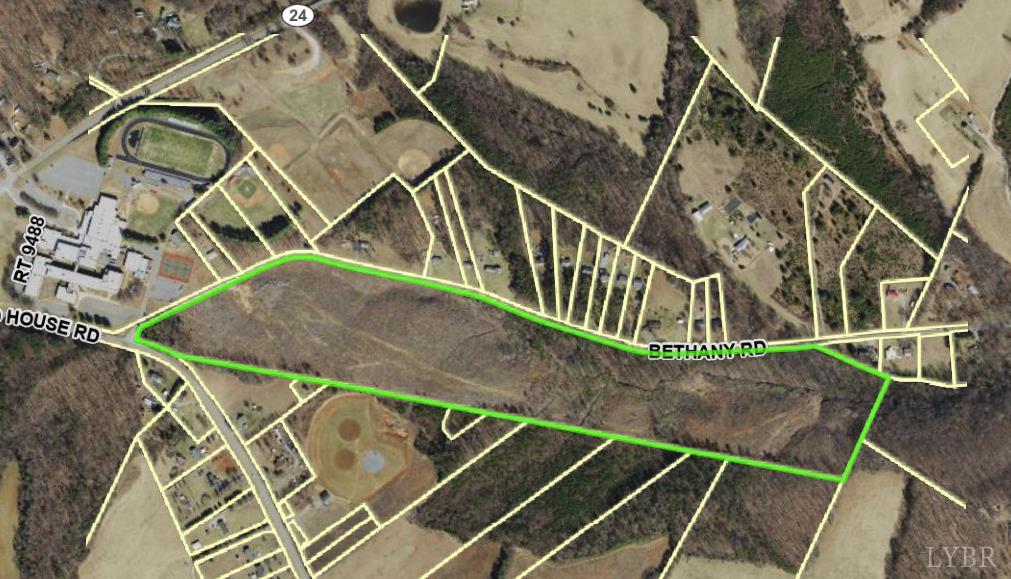 an ocean view with wooden fence