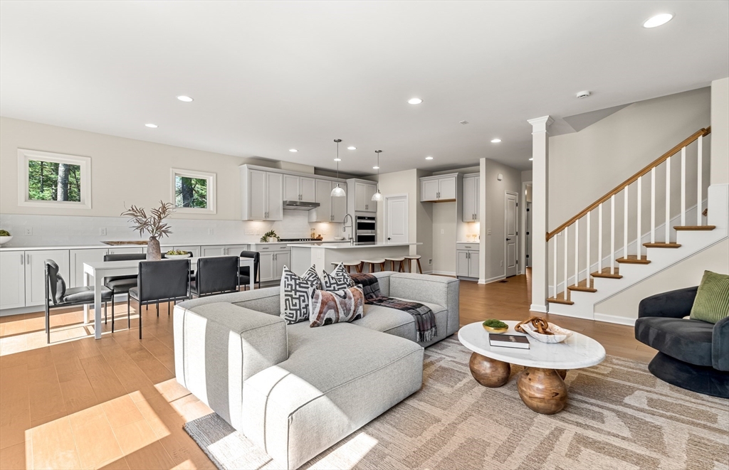 15 Sandtrap Circle, Unit 13 Walpole, MA 02081 - Photo 2 of 14 a living room with lots of furniture and view of kitchen