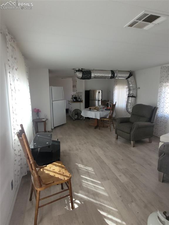 35294 Shear Road Yoder, CO 80864 - Photo 11 of 21 a living room with furniture and a fireplace