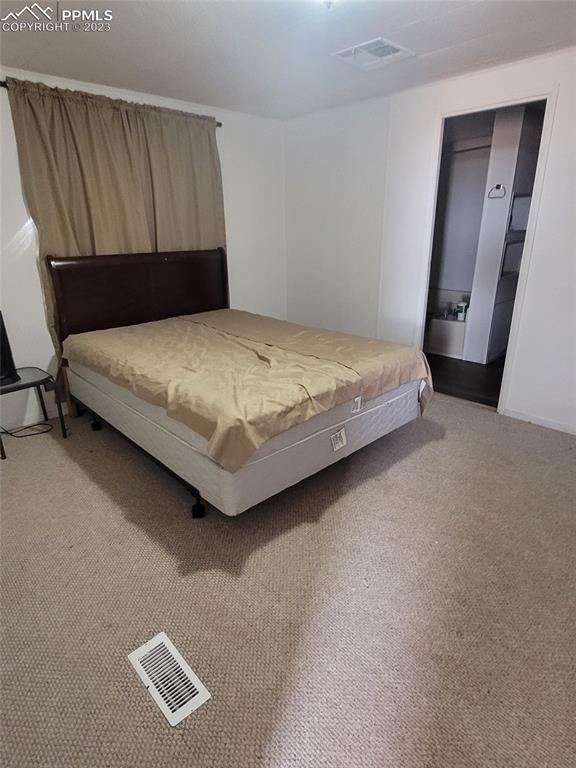 35294 Shear Road Yoder, CO 80864 - Photo 16 of 21 a bedroom with a bed and a window