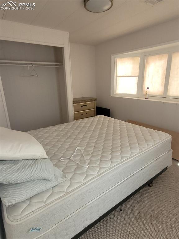 35294 Shear Road Yoder, CO 80864 - Photo 19 of 21 a bedroom with a bed and window