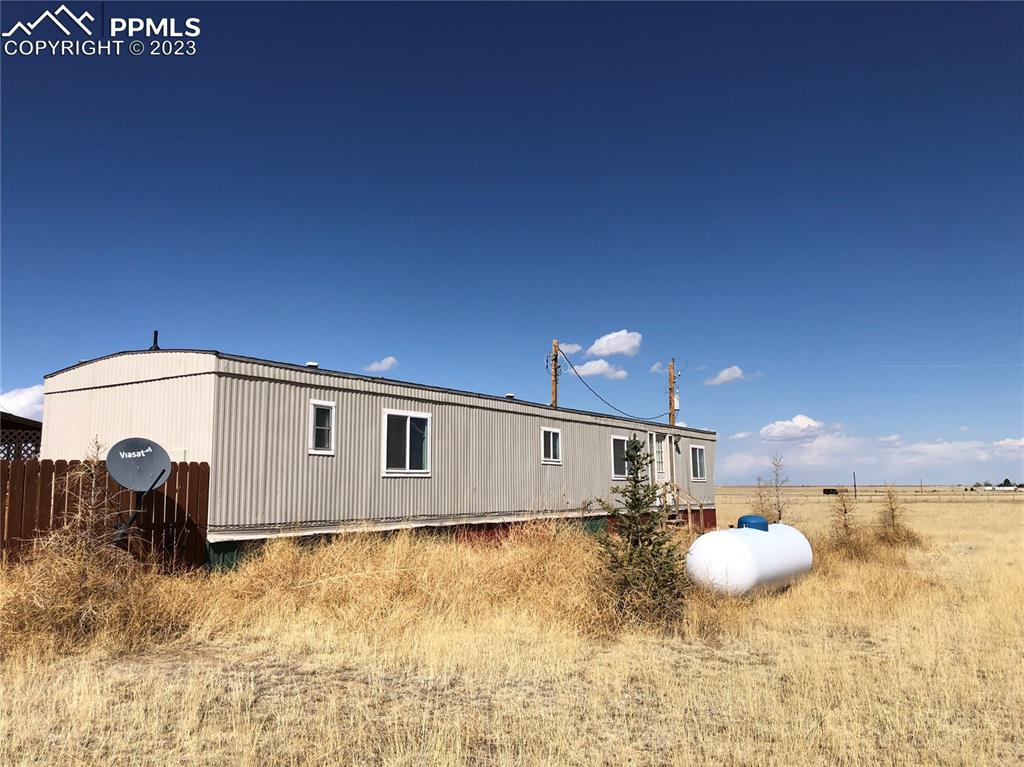 35294 Shear Road Yoder, CO 80864 - Photo 2 of 21 a view of a back yard of the house