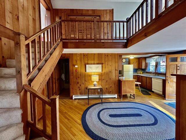 12 Sidewinder Road East Falmouth, MA 02536 - Photo 14 of 22 a view of entryway livingroom and hall with wooden floor