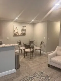 a view of a livingroom with furniture and a couch