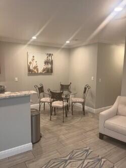 3125 Albatross Road, Unit B Delray Beach, FL 33444 - Photo 7 of 16 a view of a livingroom with furniture and a couch
