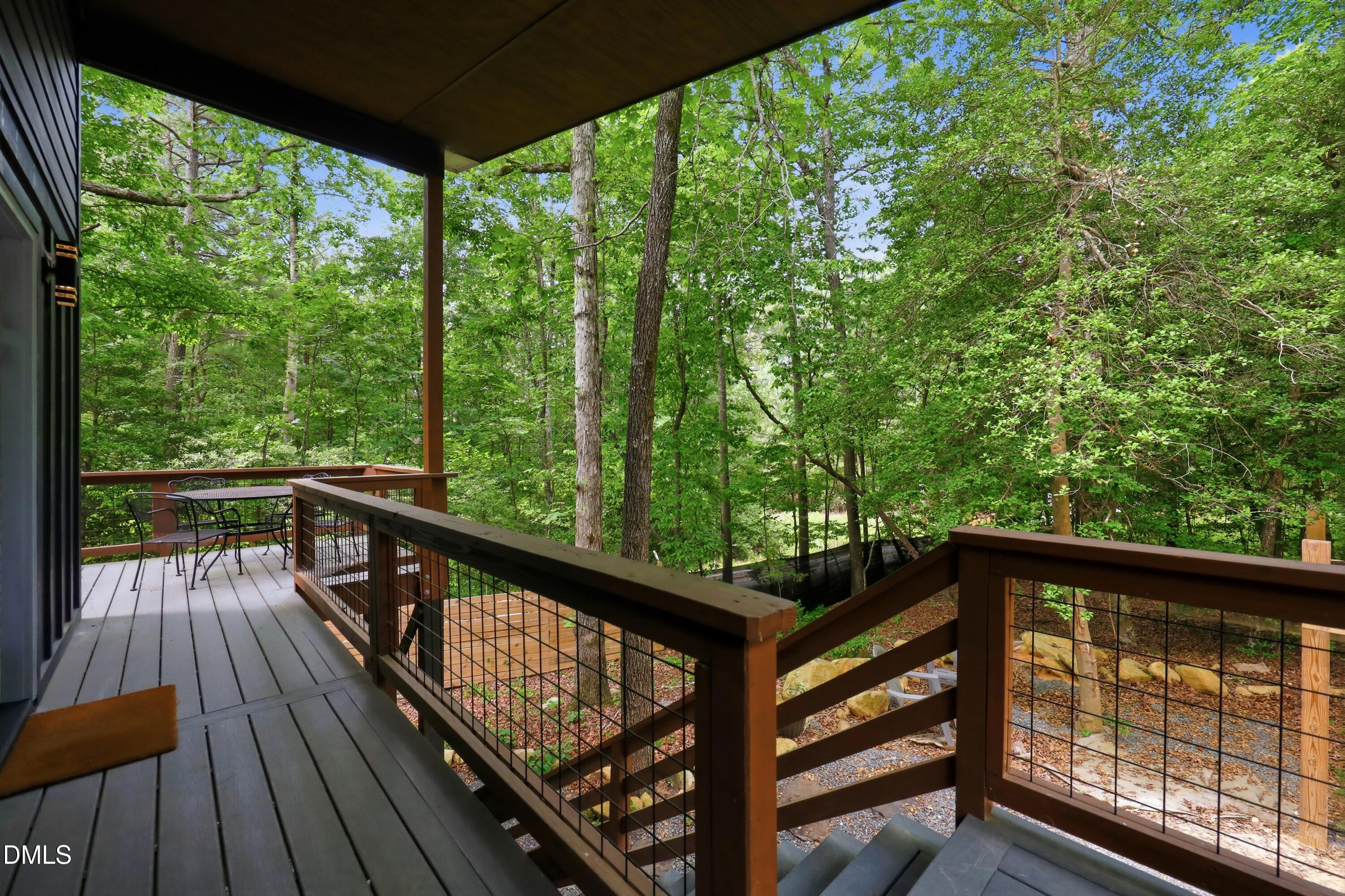 286 Stone Wall Road Pittsboro, NC 27312 - Photo 59 of 71 a view of a balcony with wooden floor