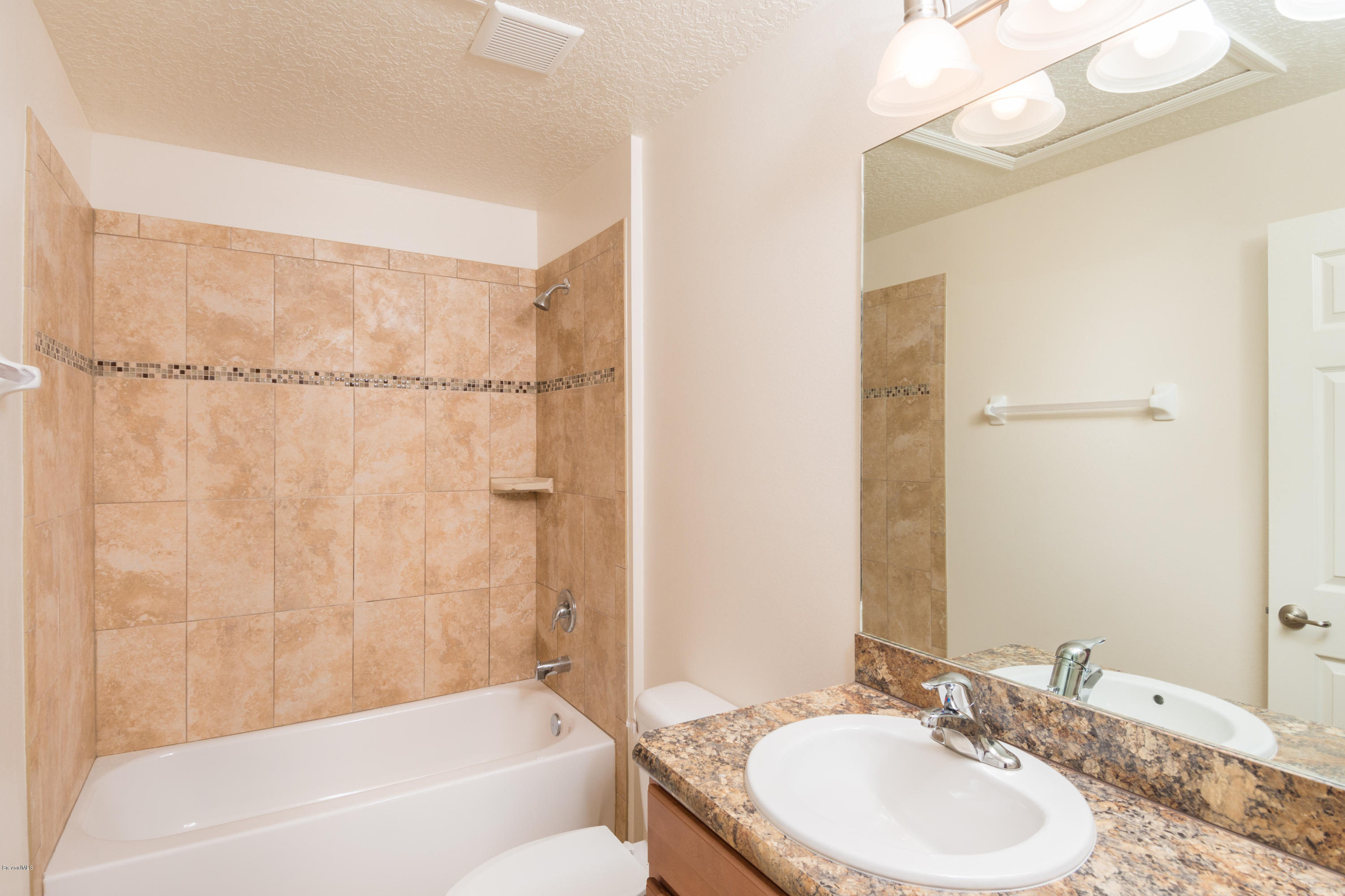 6129 Dees Road Cocoa, FL 32927 - Photo 11 of 15 Tiled Shower Enclosure 2 Bath