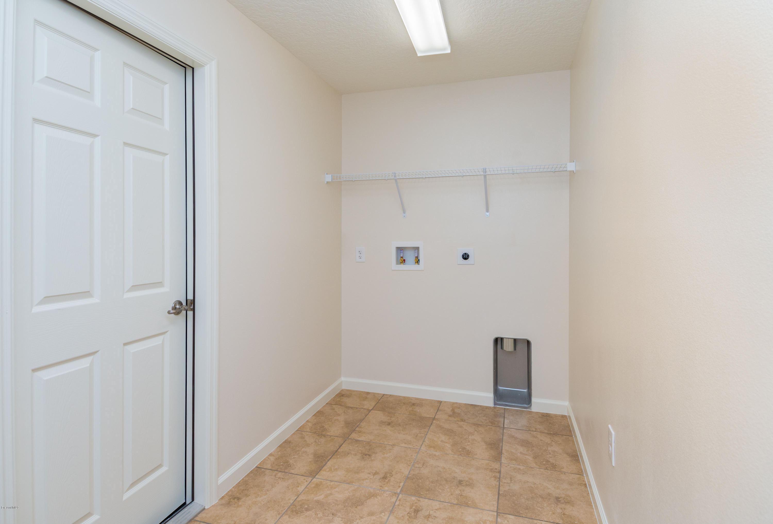 6129 Dees Road Cocoa, FL 32927 - Photo 15 of 15 Large, Separate Laundry Room