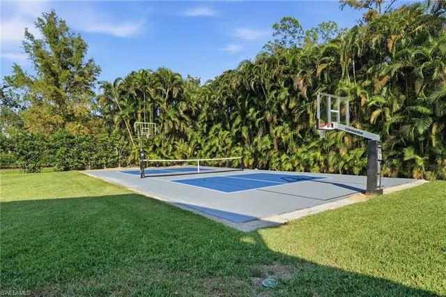 a view of yard with swimming pool