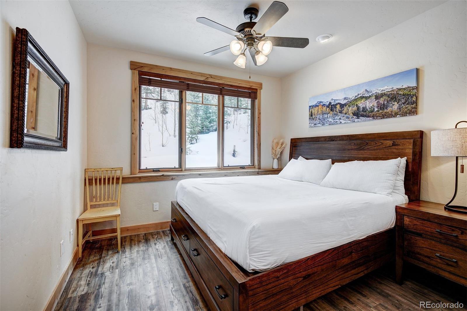 35 Tip Top Trail, Unit 6500 Keystone, CO 80435 - Photo 13 of 24 a bedroom with a bed and a window