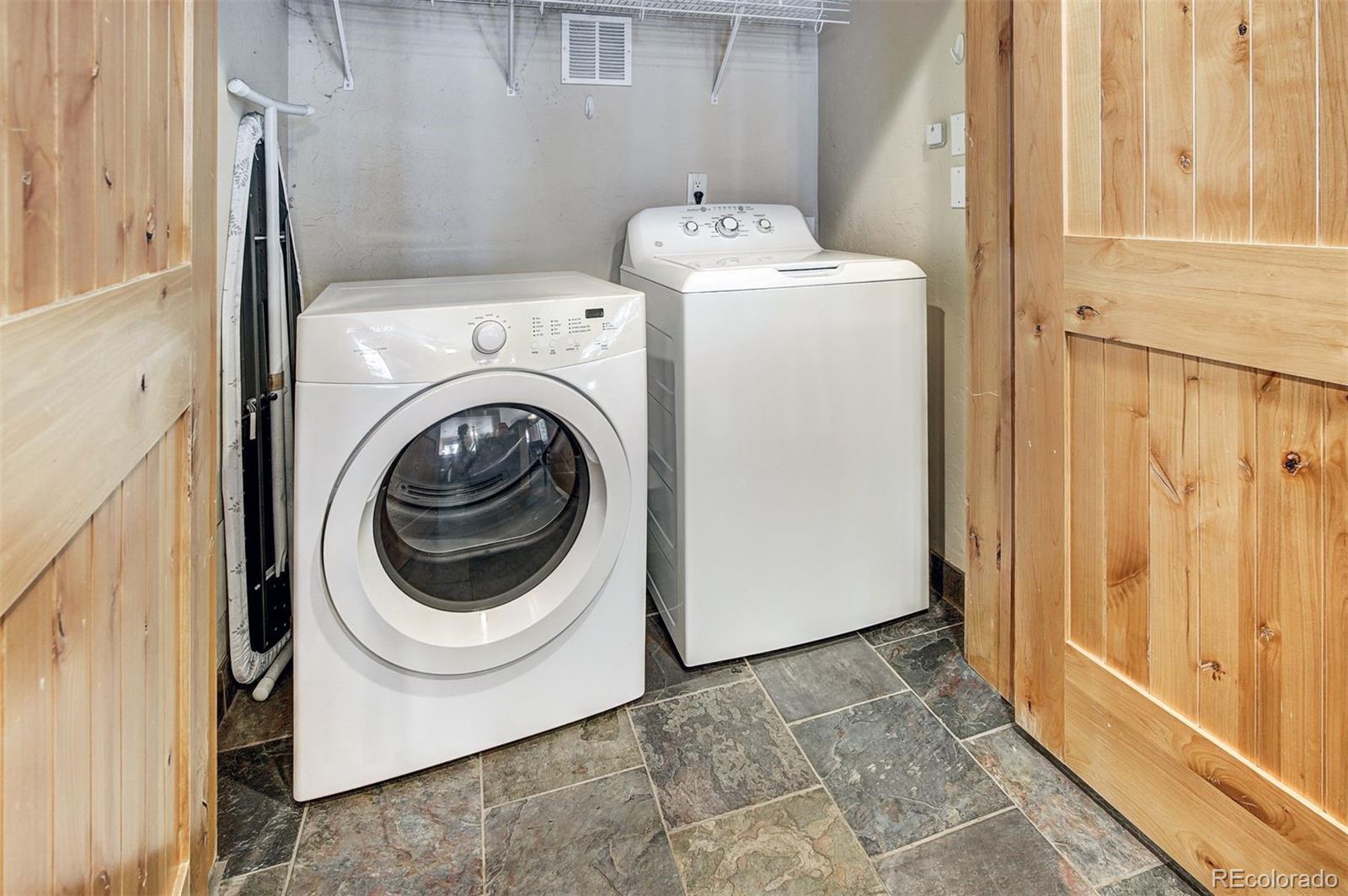 35 Tip Top Trail, Unit 6500 Keystone, CO 80435 - Photo 20 of 24 a utility room with dryer and washer