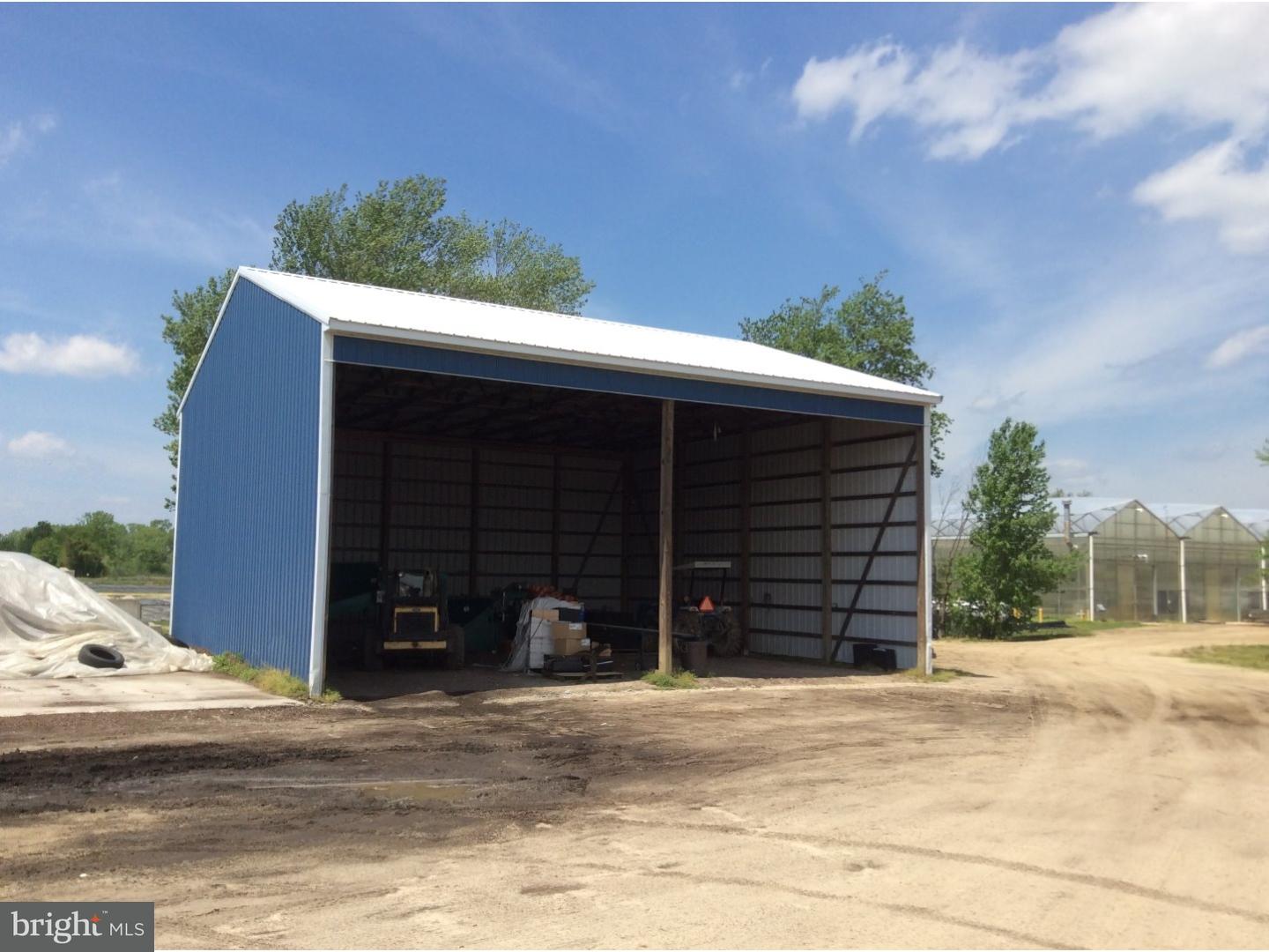 126 Sunset Drive Mannington, NJ 08079 - Photo 14 of 25 a front view of a house with a yard