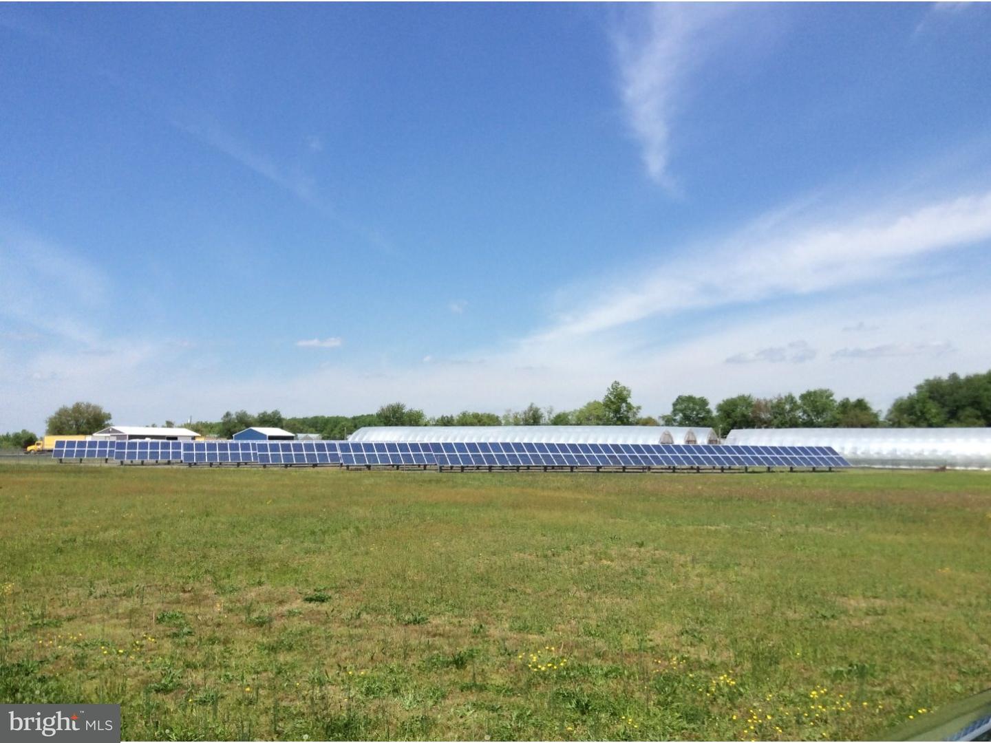 126 Sunset Drive Mannington, NJ 08079 - Photo 24 of 25 a view of a lake with houses in the back