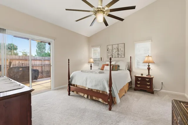 a bed room with a bed and a couch