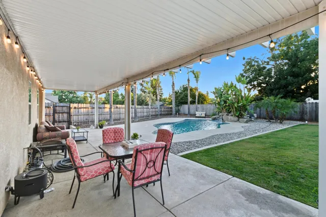 a view of outdoor space with wooden fence