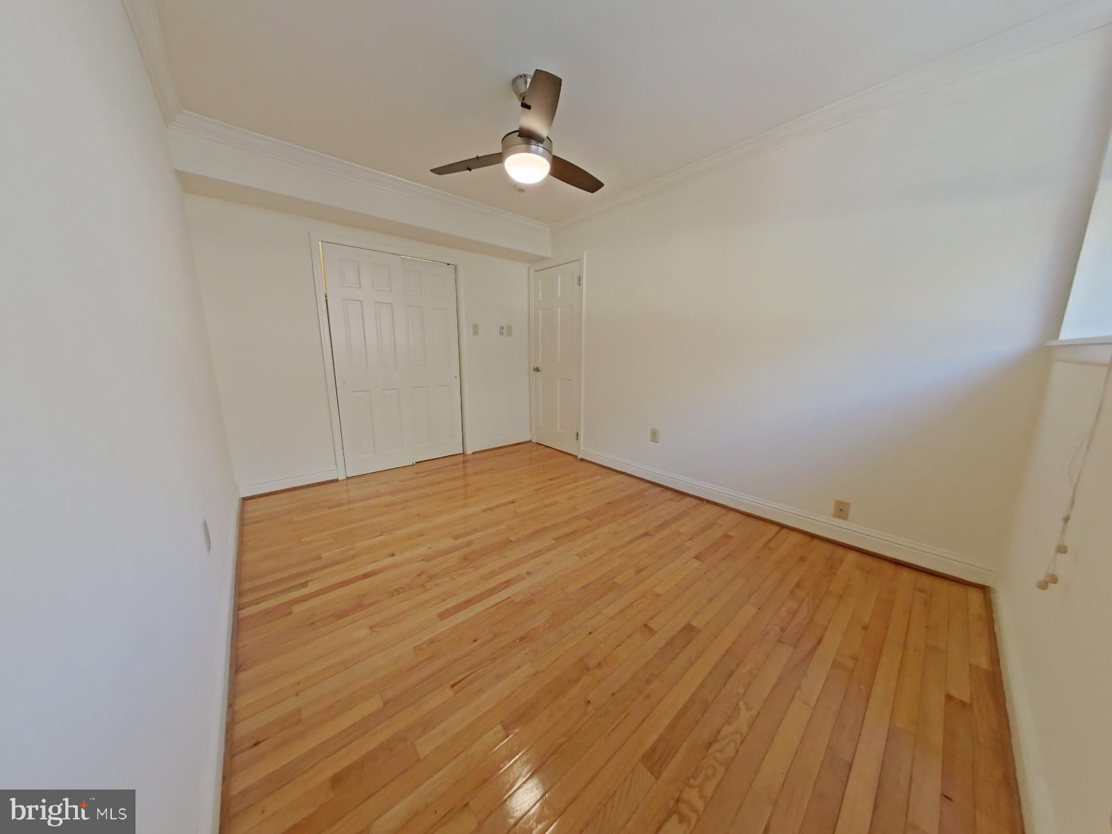 610-12 Bainbridge Street, Unit 2 Philadelphia, PA 19147 - Photo 16 of 23 a view of empty room with wooden floor