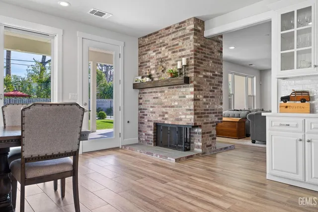 a view of a dining area with furniture and wooden floor