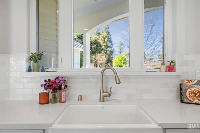 a spacious bedroom with a bed a couch and a couch