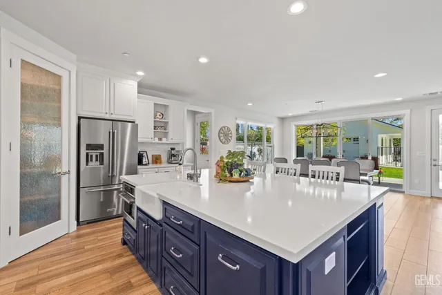 a bedroom with a bed and a fireplace