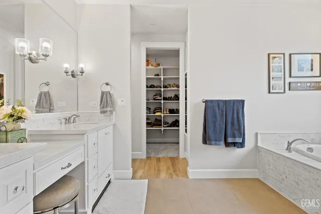 a view of a house with backyard sitting area and garden