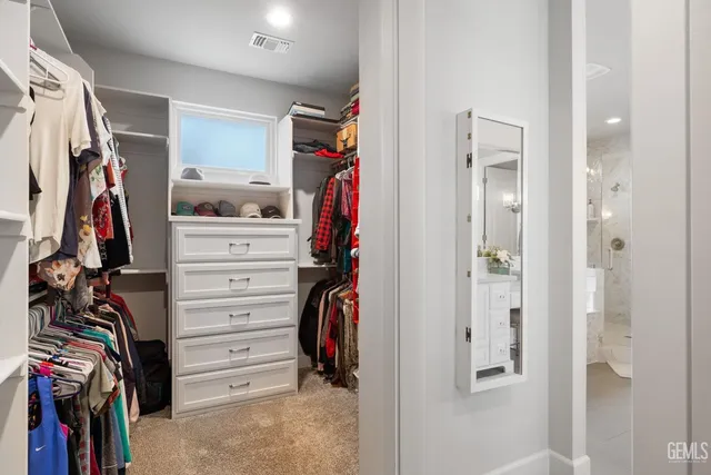 a bed room with a bed and a couch