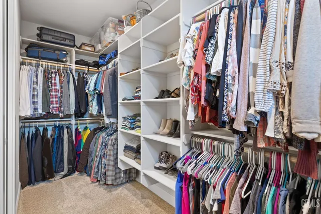 a bedroom with a bed furniture and a window